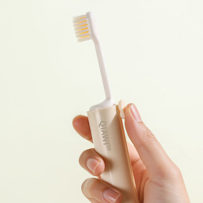 QIAWI™ Foldable Travel Toothbrush with Toothpaste Dispenser
