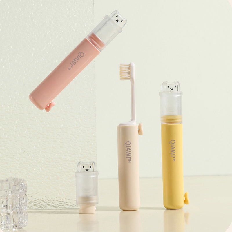 QIAWI™ Foldable Travel Toothbrush with Toothpaste Dispenser